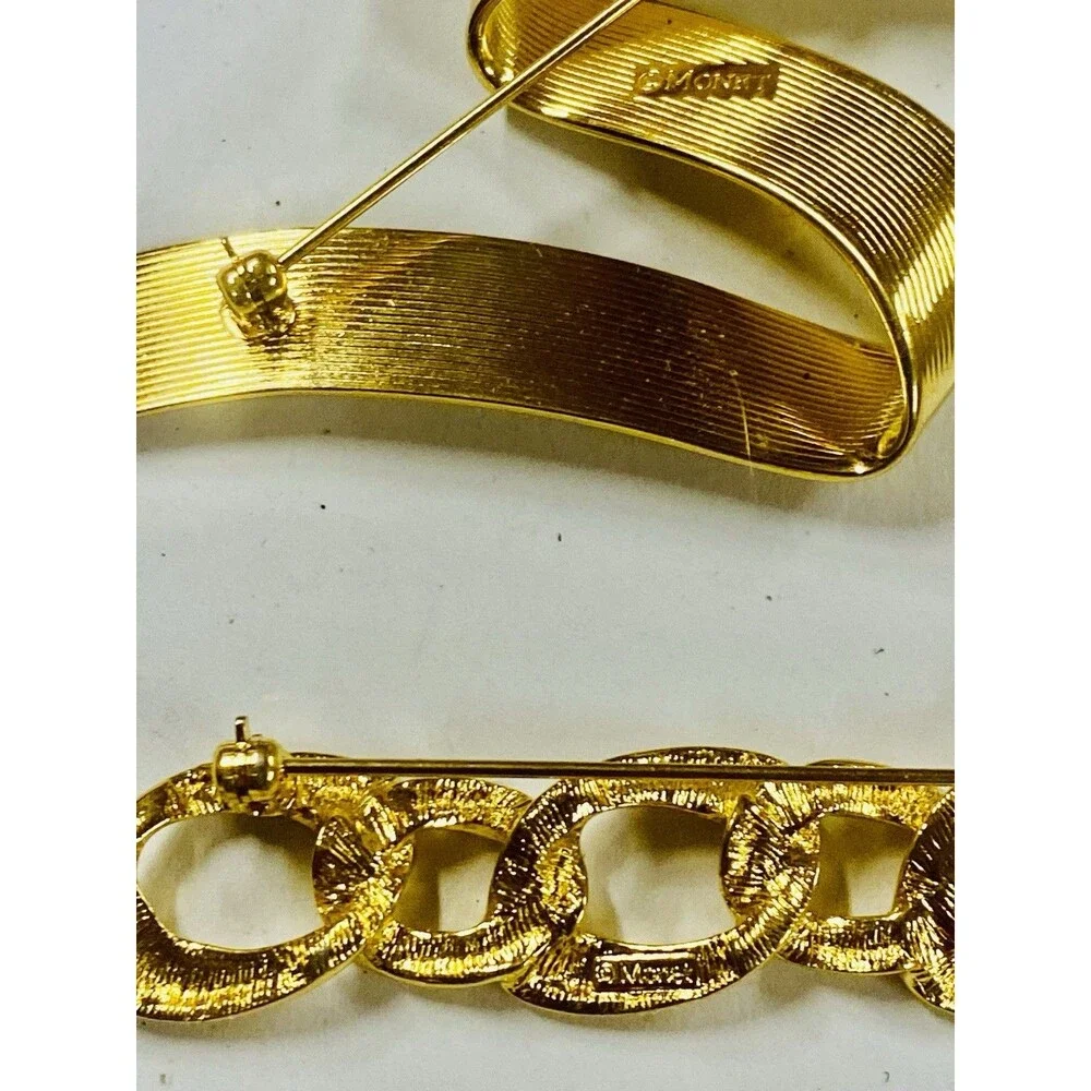 Lot 2 Vintage Monet Brooches Gold Tone Ribbon Curl Chain Link 1980s Signed